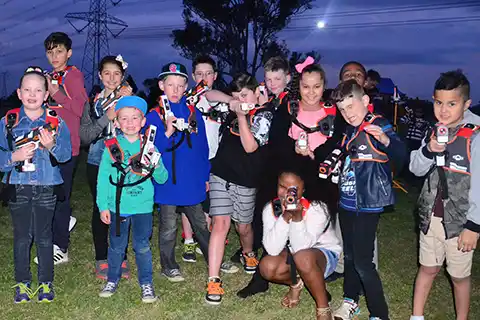 children having fun birthday laser tag party